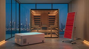 Luxury Set — true-scale group shot: white two-person ice bath (206 cm), 4-person light-walnut hybrid sauna (216 cm), RLPRO2000L red-light panel on stand (192 cm) in a Dubai penthouse spa