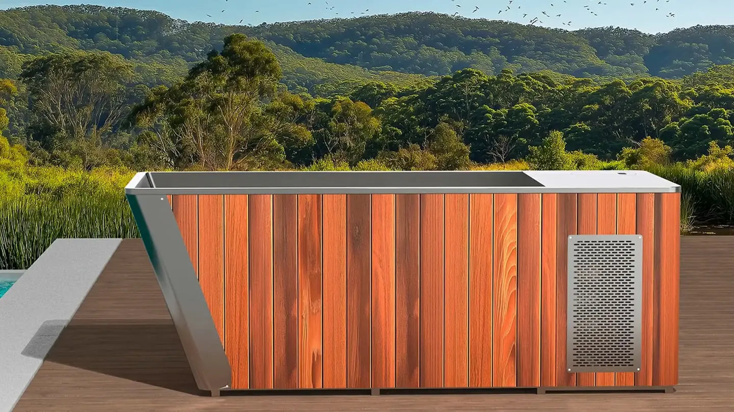 Wood and stainless steel G5 ice bath beside a pool and garden